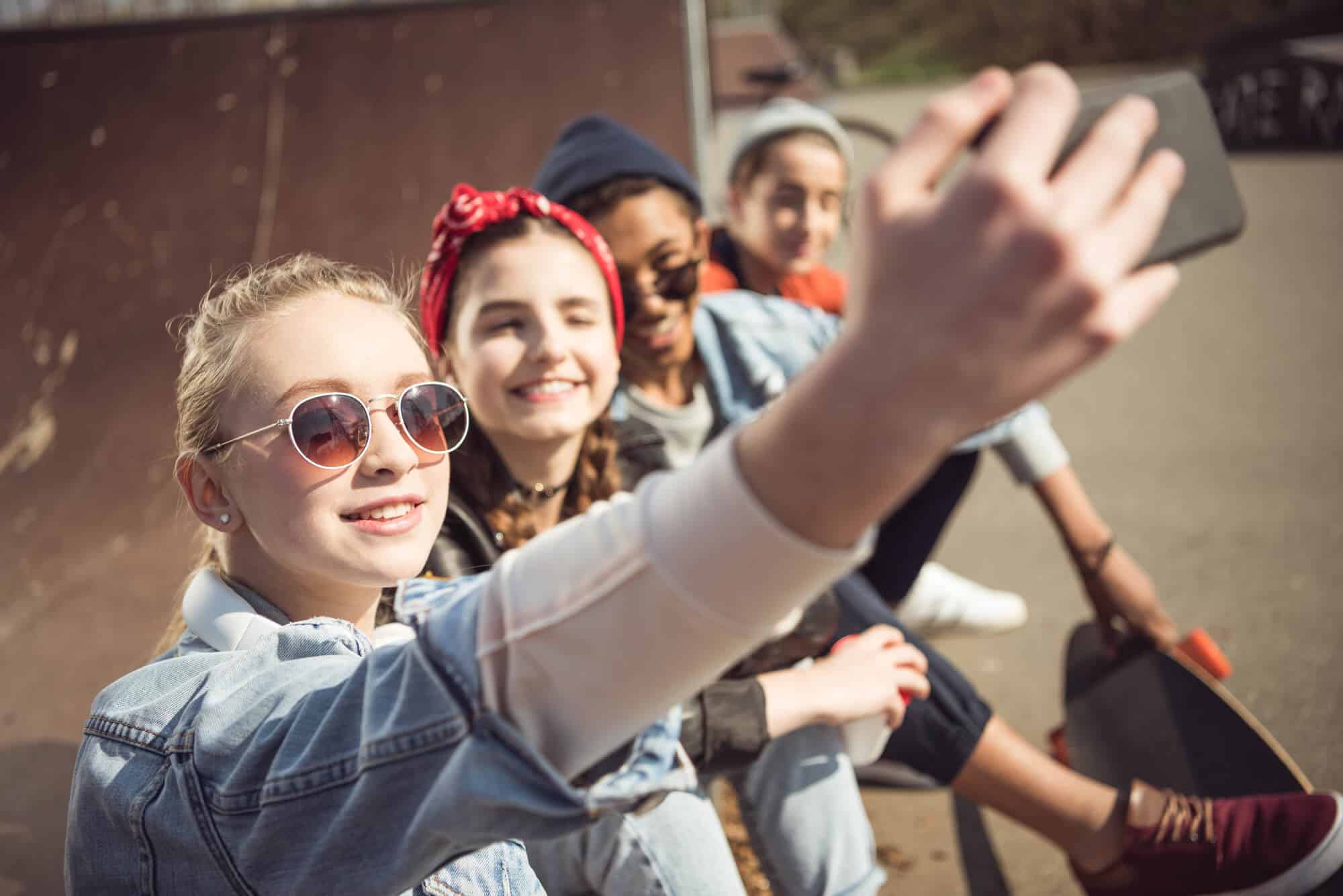 teens taking a selfie